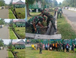 Kodim 1307/Poso Laksanakan Program Karya Bakti TNI Bersama Warga Bersihkan Saluran Air